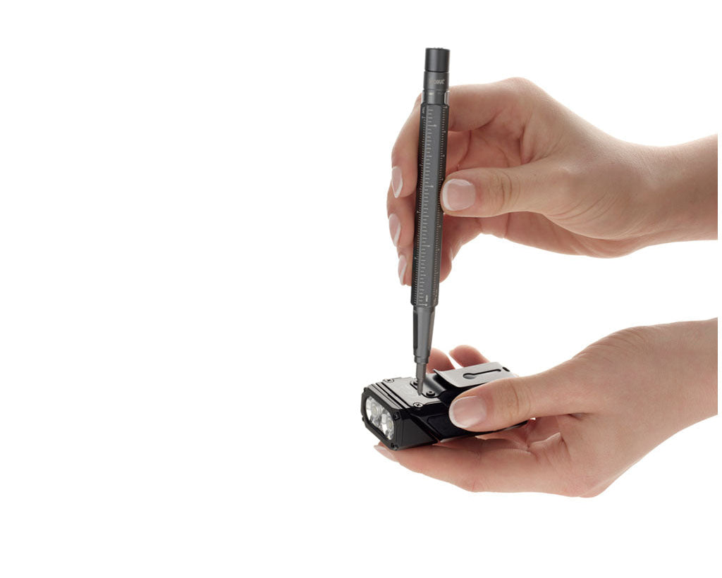 TROIKA Multi Tool Construction Tool 13 Titanium – BIT20/TI in hands showing product functions