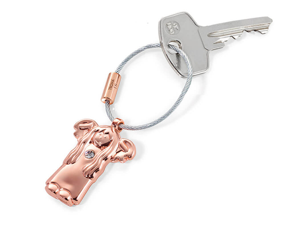 Two TROIKA Guardian Angel keychains, one in rose gold and one in silver, each featuring a figure in a nightgown design with a SWAROVSKI crystal.