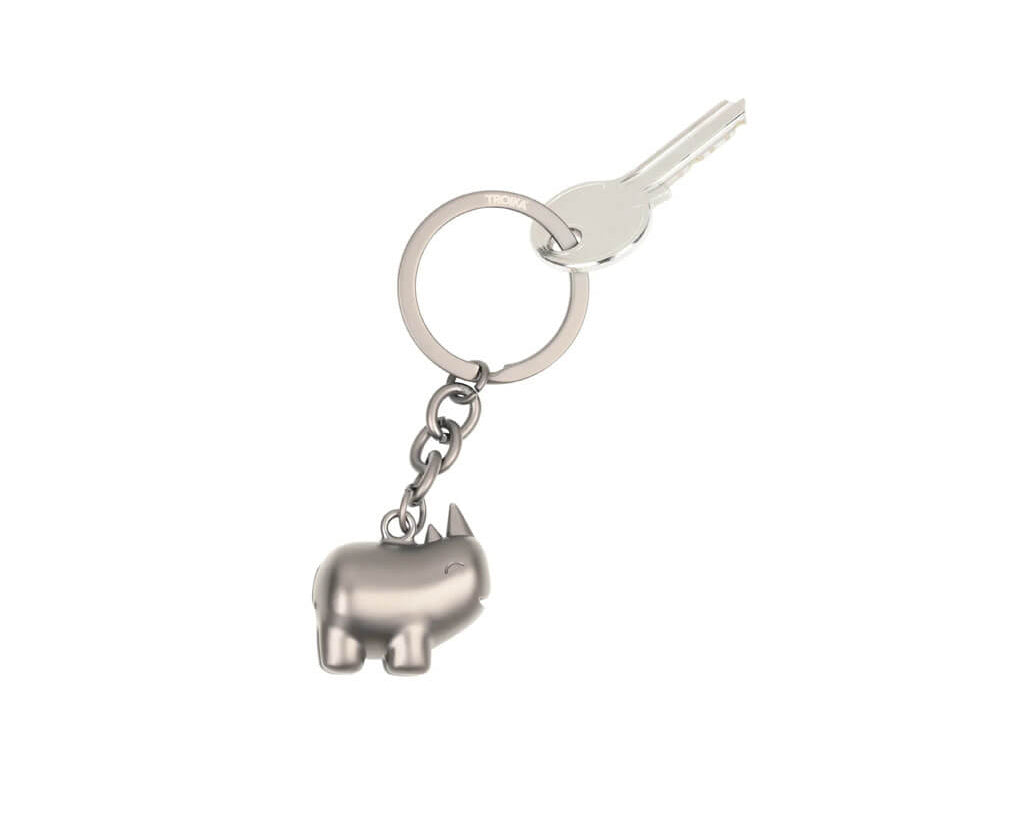 TROIKA HAPPY RHINO keyring featuring a cute rhinoceros design in matt gunmetal chrome-plated metal. A cheerful accessory and gift with personality.