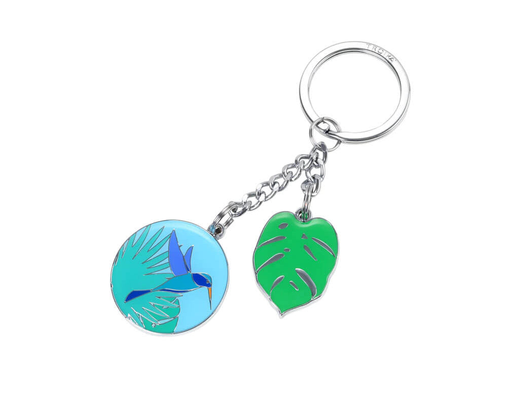 TROIKA KOLIBRI keyring with colourful hummingbird and monstera leaf charms in blue, turquoise and green enamel. A nature-inspired accessory full of charm.