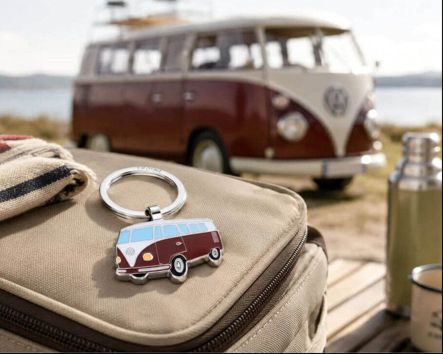 TROIKA VW BULLI T1 keyring in vibrant red, featuring the iconic Volkswagen van in shiny chrome-plated metal with enamel details. A perfect gift for VW fans.