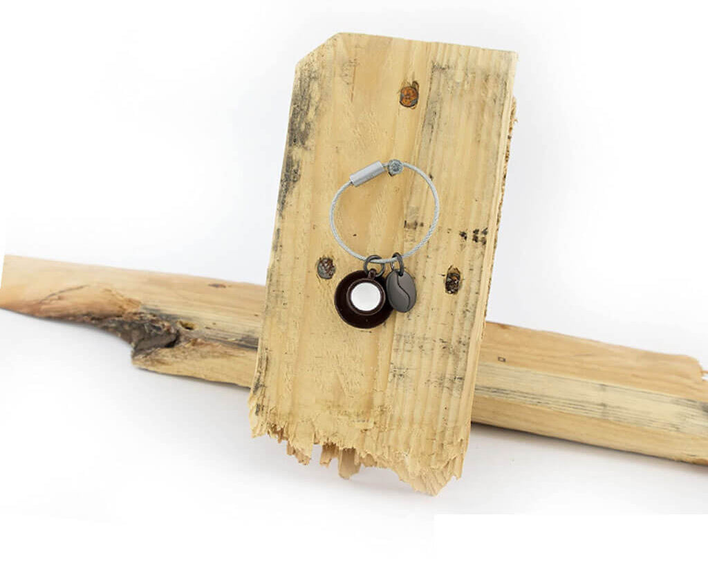 Troika keychain "Coffee 2 GO" with wood in background
