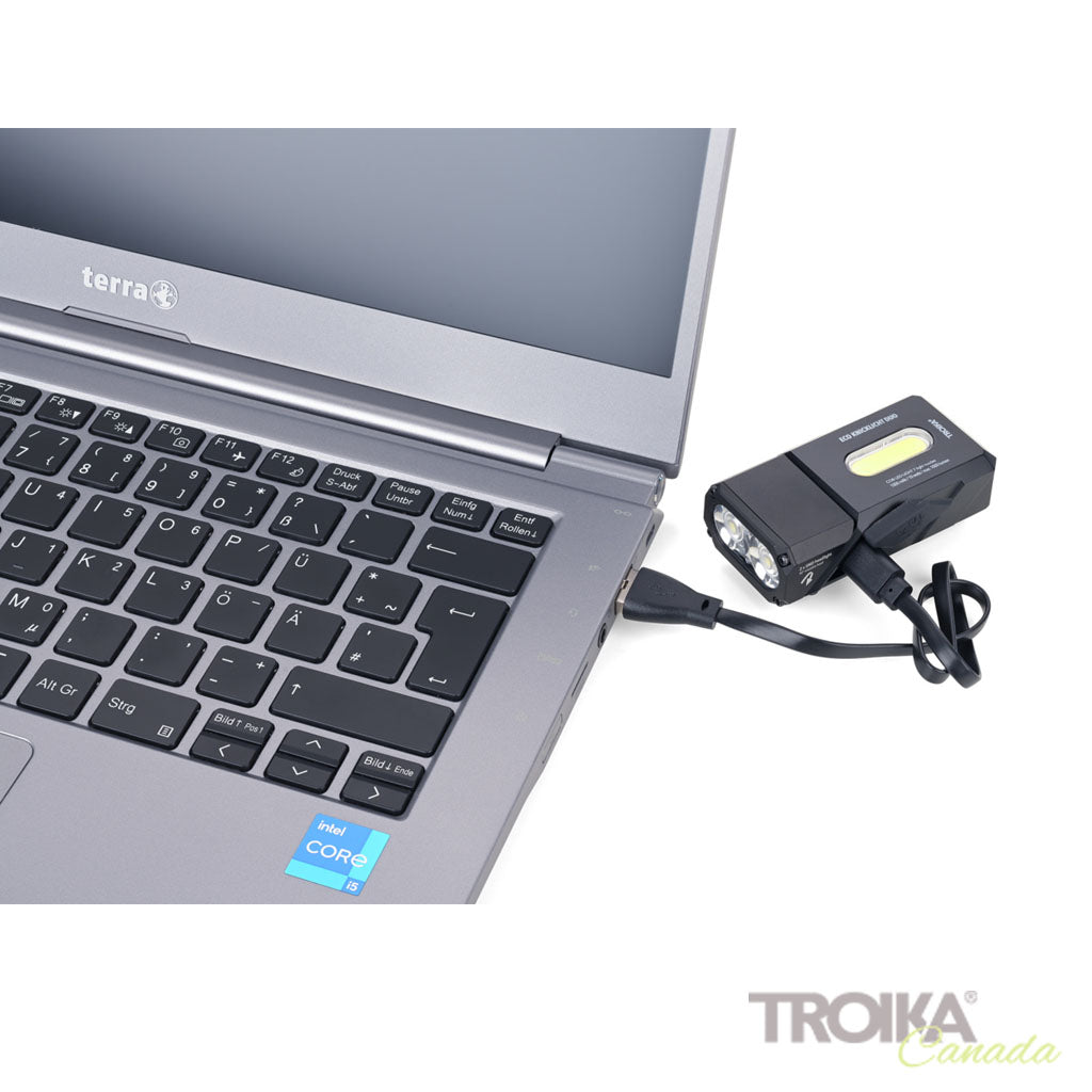TROIKA Flashlight Eco Knicklicht Duo Black – TOR35/BK charging on Laptop