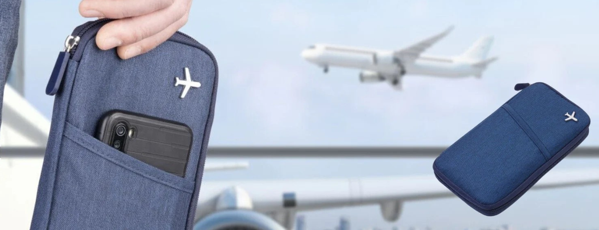 Blue travel pouch with a phone case, airplane in the background