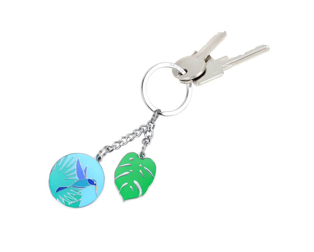 TROIKA KOLIBRI keyring with colourful hummingbird and monstera leaf charms in blue, turquoise and green enamel. A nature-inspired accessory full of charm.